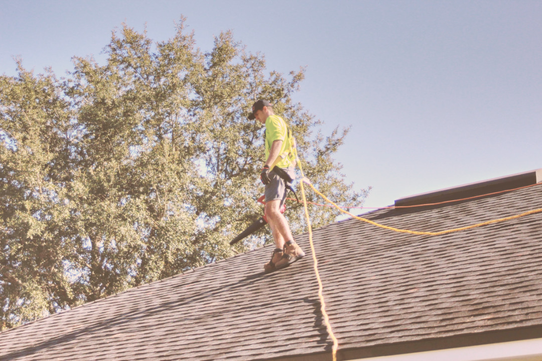 gutter cleaner on roof